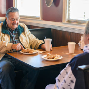 Retired couple enjoying southern biscuit breakfast at Mamies Kitchen